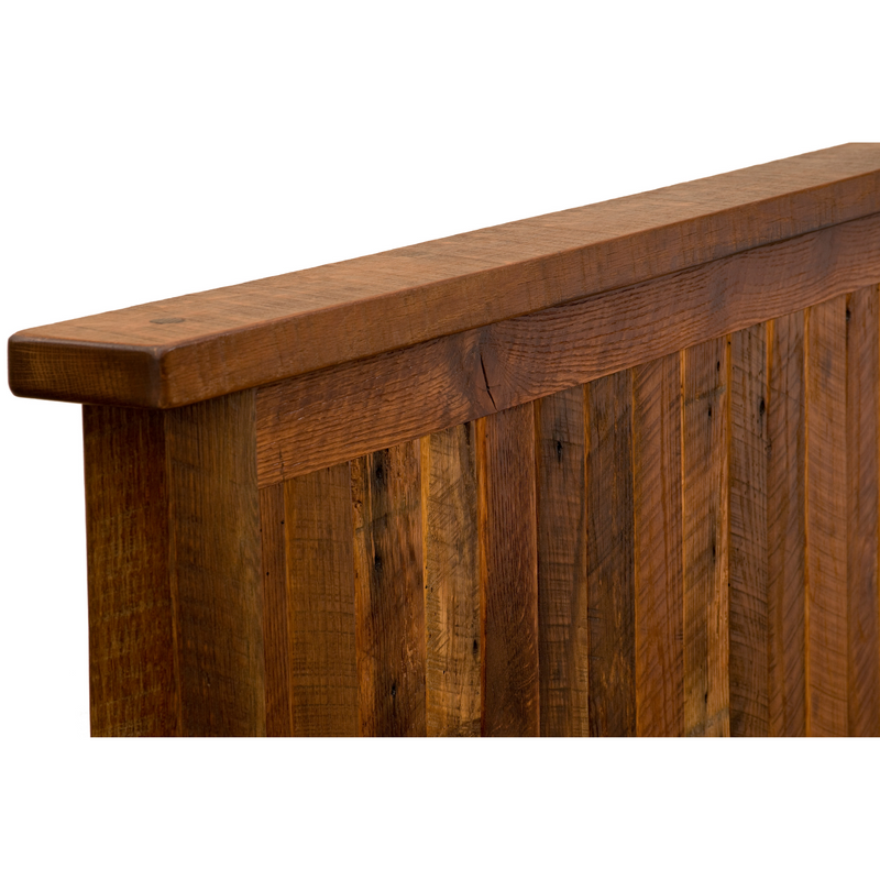 Close-up of a wooden headboard with a white background