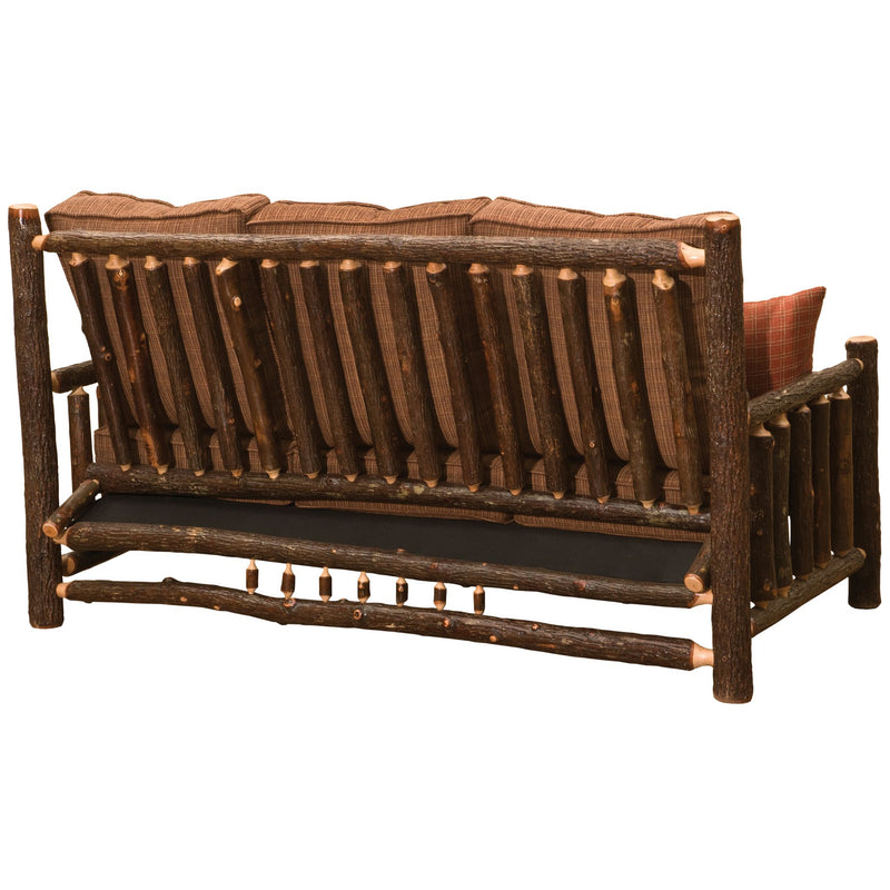 Back view of Hickory Log Sofa with brown cushions on a white background